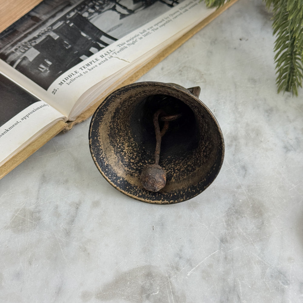 Vintage brass cow bell.