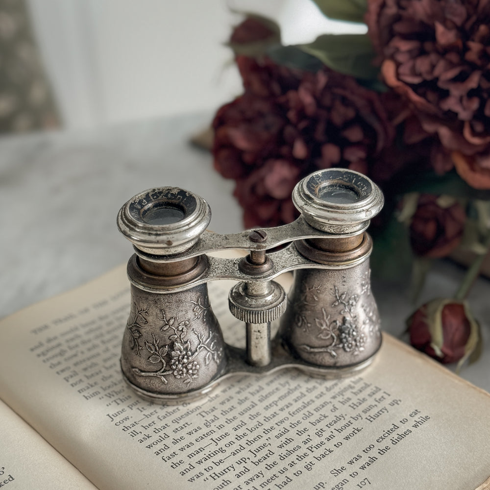 Vintage bird embossed opera glasses.