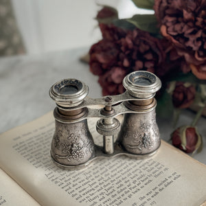 Vintage bird embossed opera glasses.