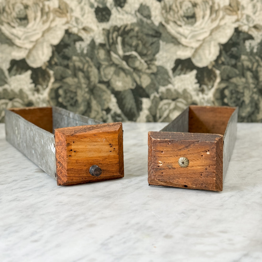 Vintage galvanized hardware drawers.