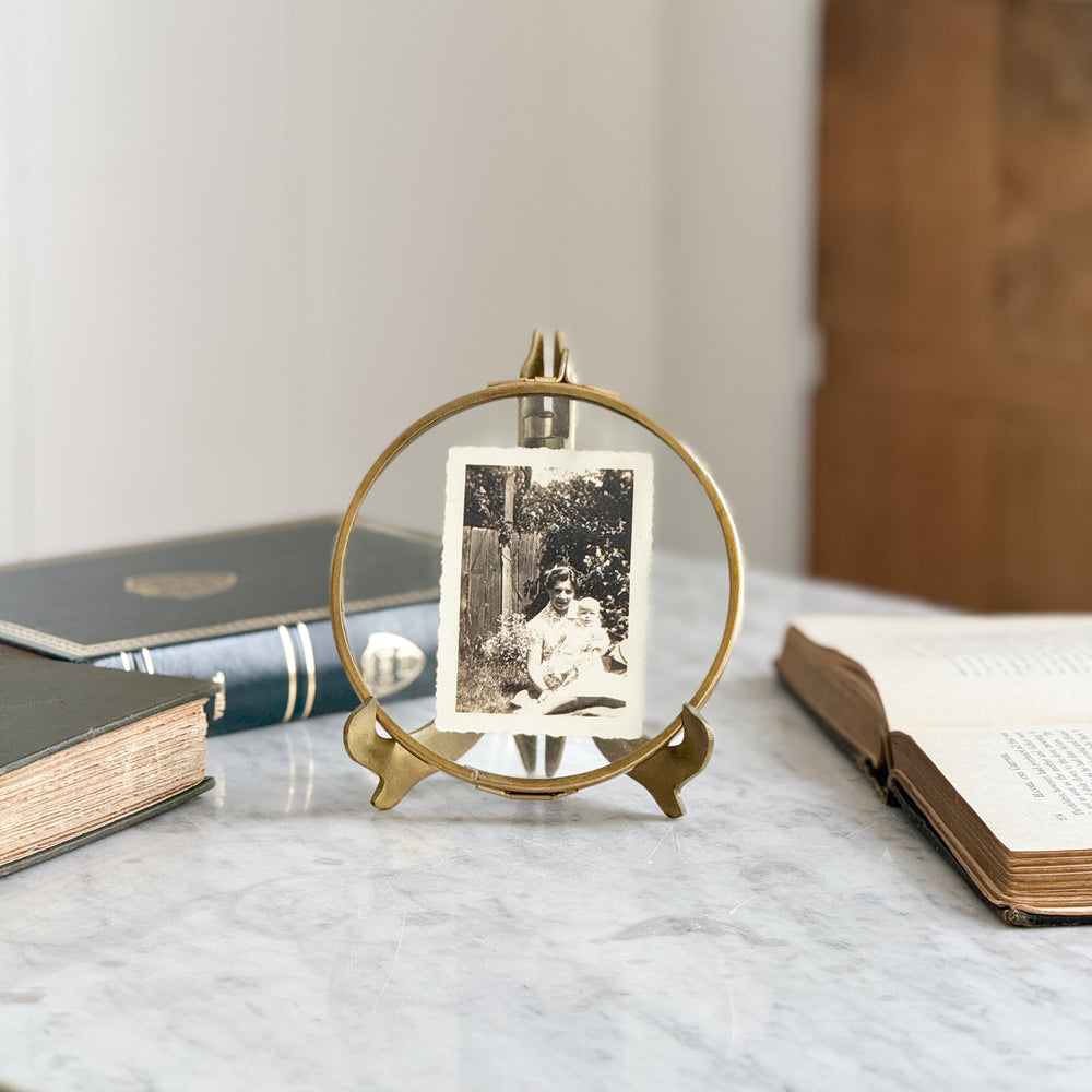 Vintage brass folding picture stand.