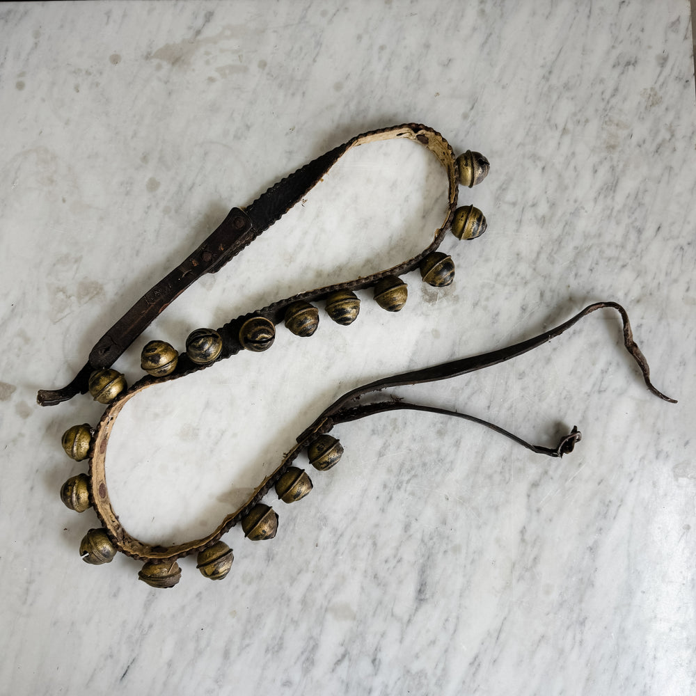 vintage leather sleigh bell set.