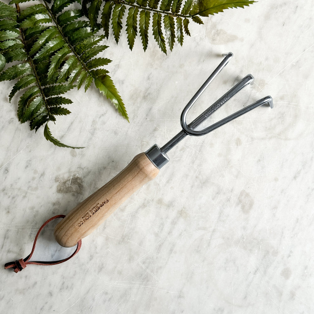 Stainless cultivator garden rake