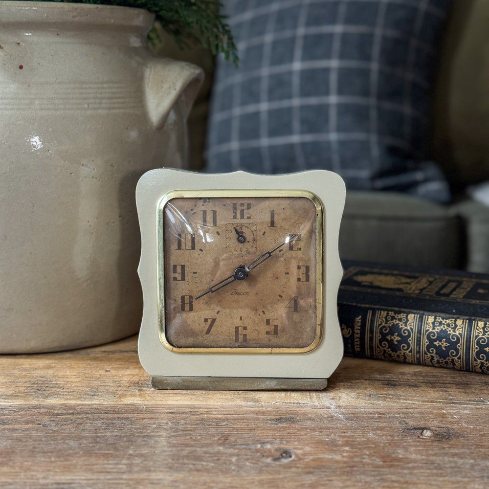 Vintage cream wave Beacon clock.