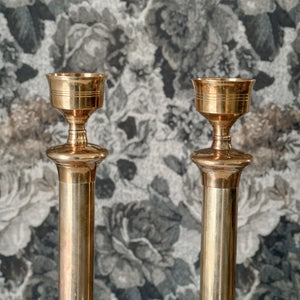 Vintage large brass taper pair.