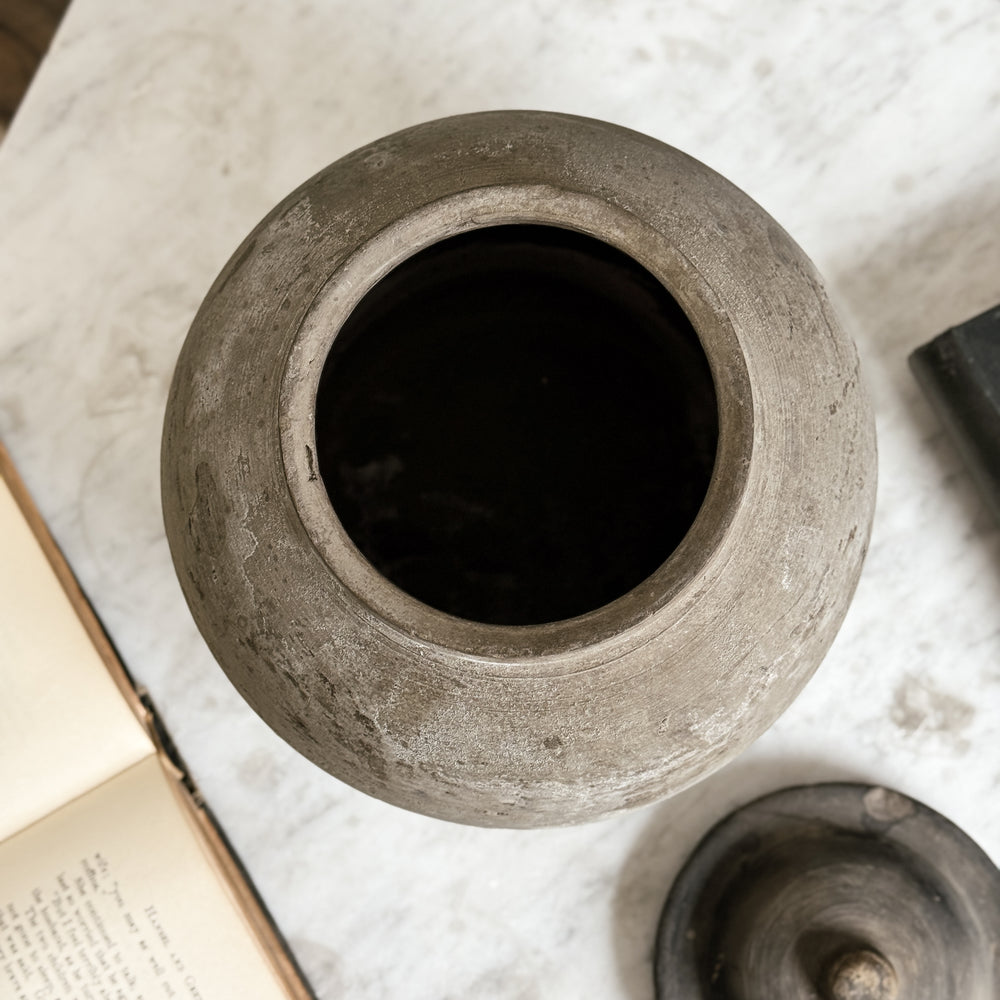 Vintage black pottery vase w/lid.