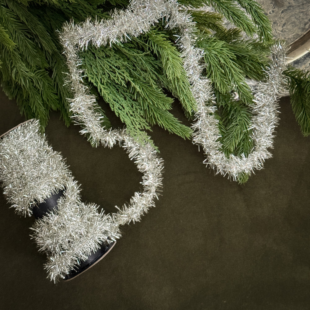 Vintage style silver tinsel garland.