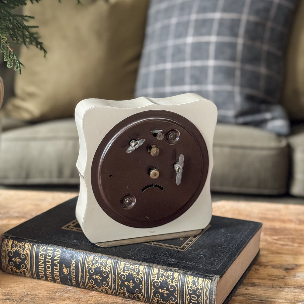 Vintage cream wave Beacon clock.