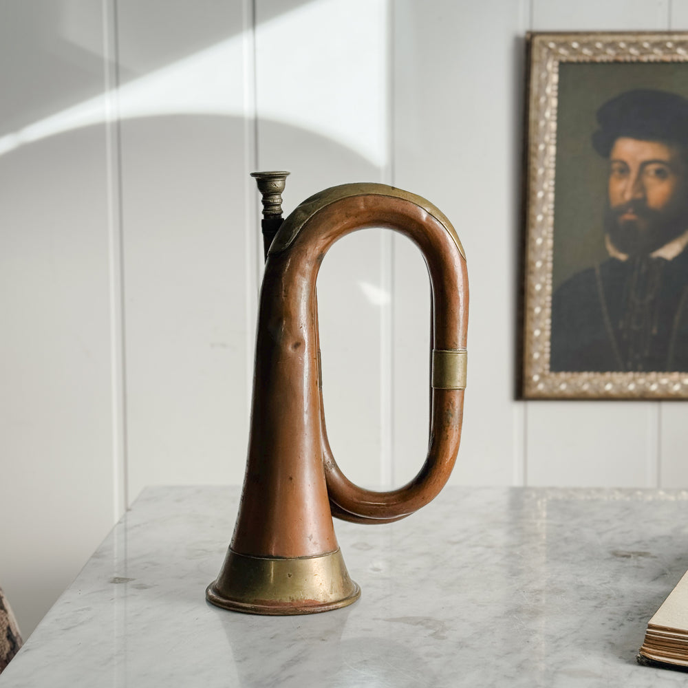 Antique copper bugle.