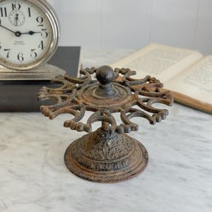 Vintage cast iron stamp holder