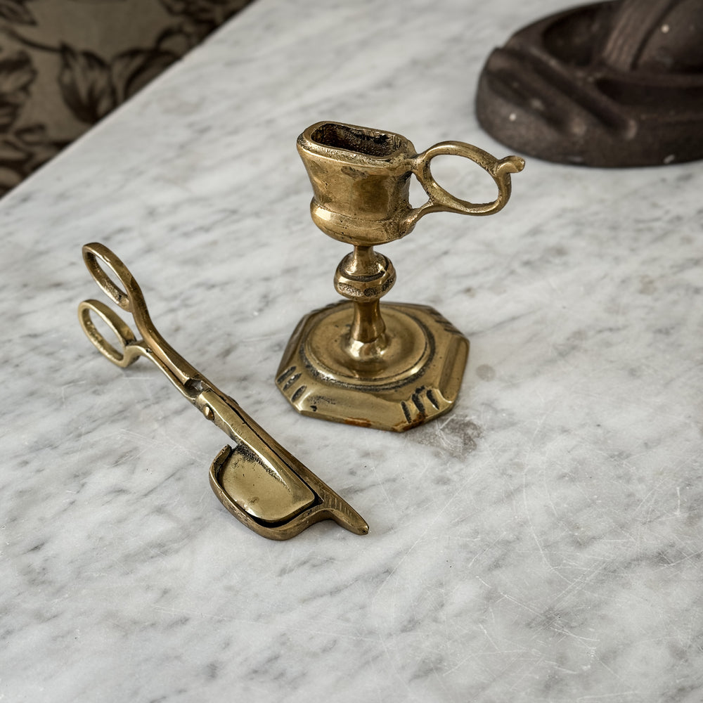 Vintage brass England candle snuffer with stand.