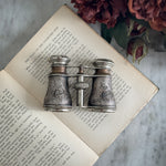 Vintage bird embossed opera glasses.