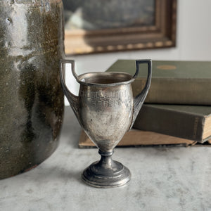 Vintage Clogg's Ltd trophy.