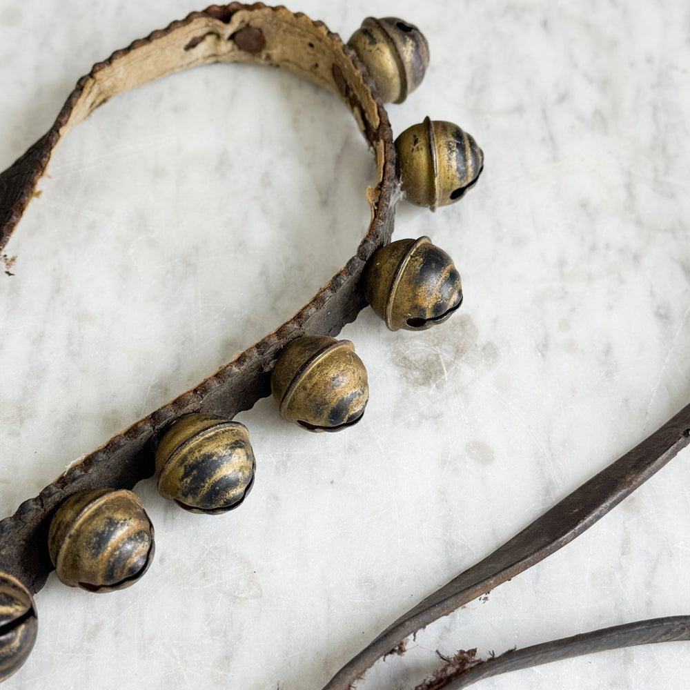 vintage leather sleigh bell set.