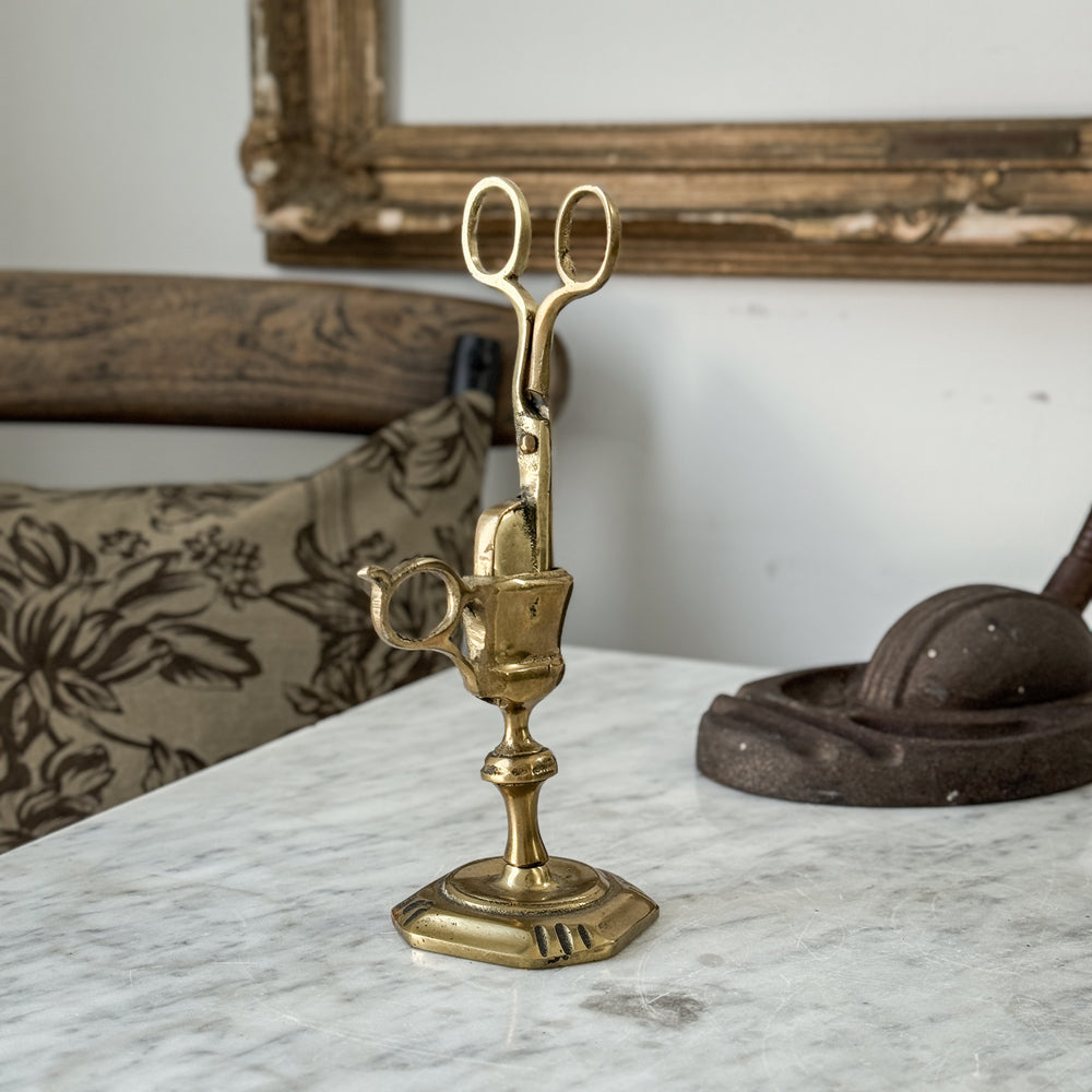 Vintage brass England candle snuffer with stand.