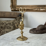 Vintage brass England candle snuffer with stand.