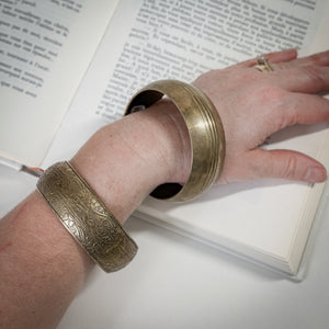 Vintage brass bangle pair.