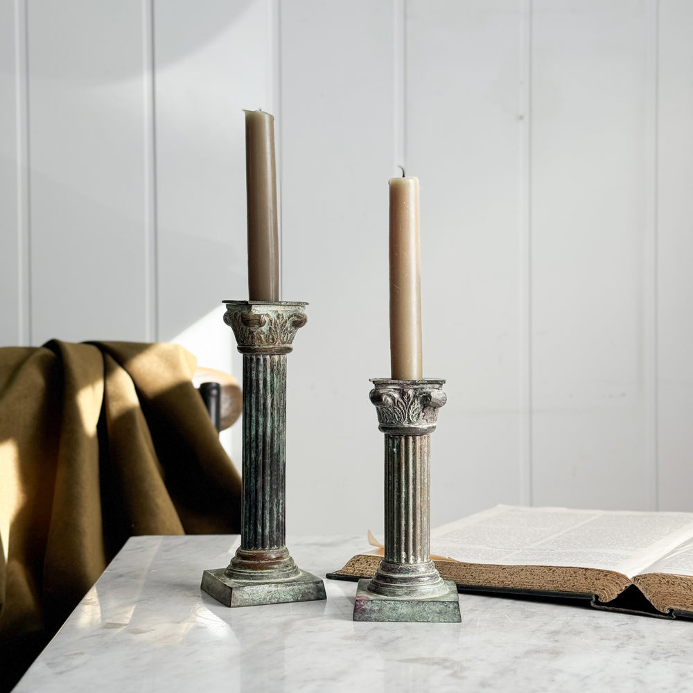 Vintage patina column taper candleholder pair.