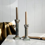 Vintage patina column taper candleholder pair.