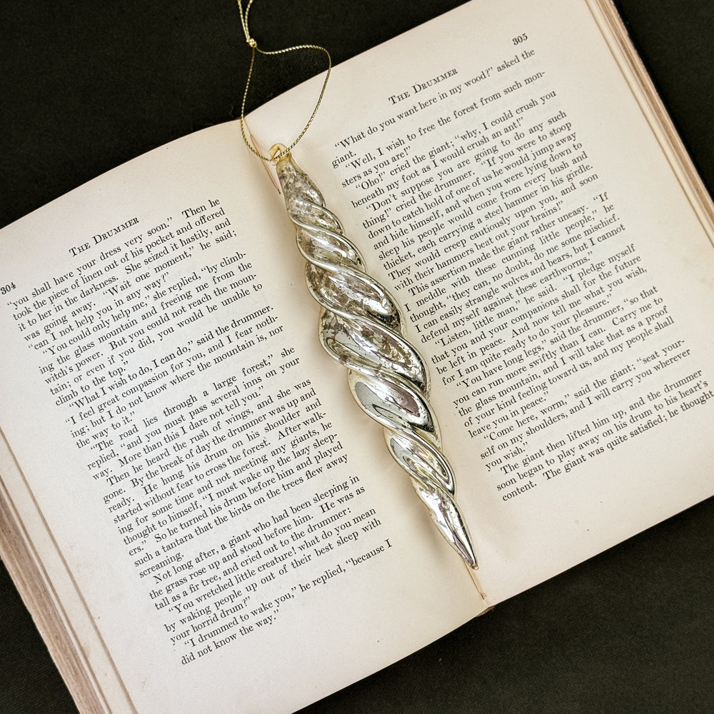 Glass spiral silver ornament.