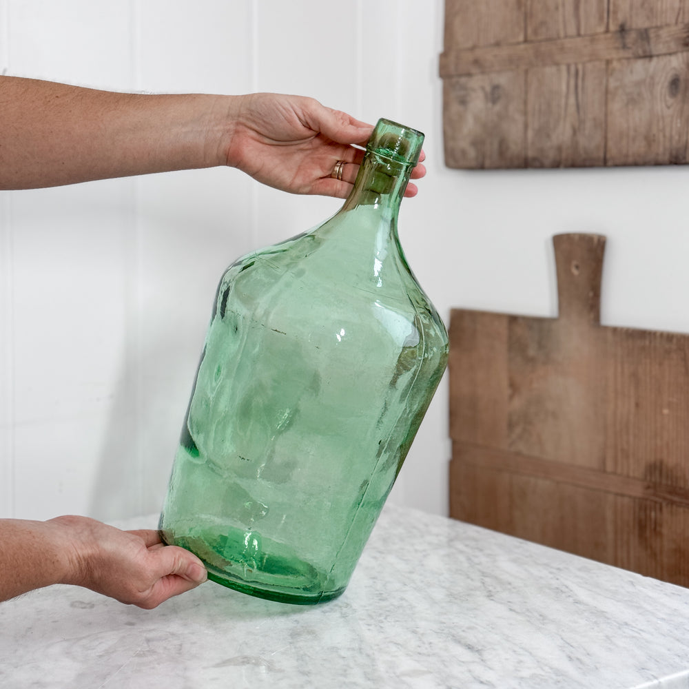 Vintage green European demijohn