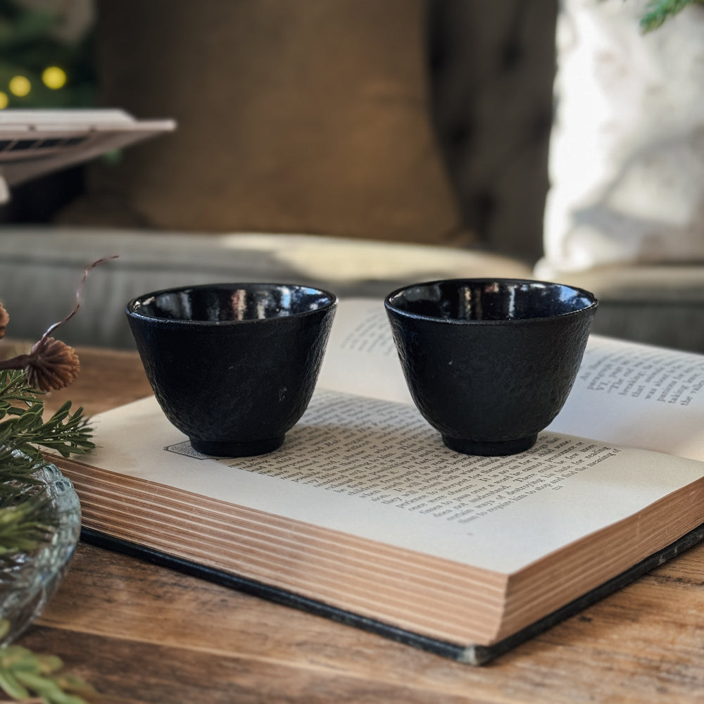 Vintage small black bowl cups.