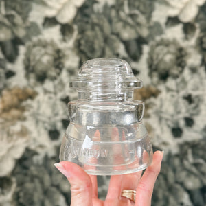 Vintage clear glass insulator.