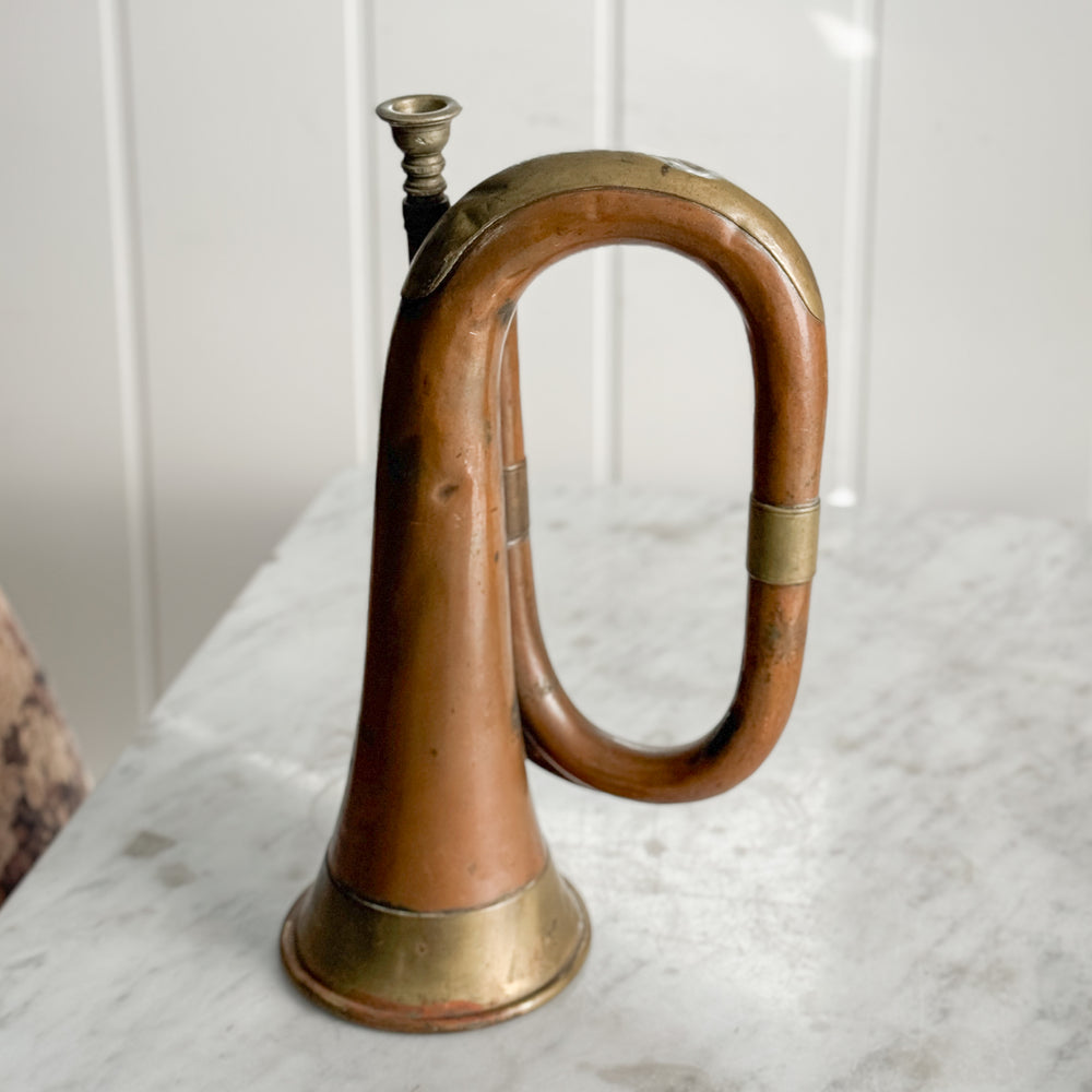 Antique copper bugle.
