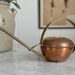 Vintage copper watering can.