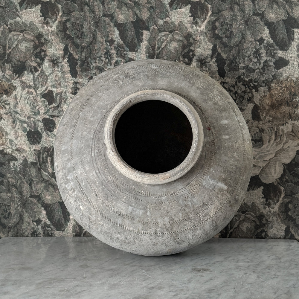 Vintage black clay mud pot