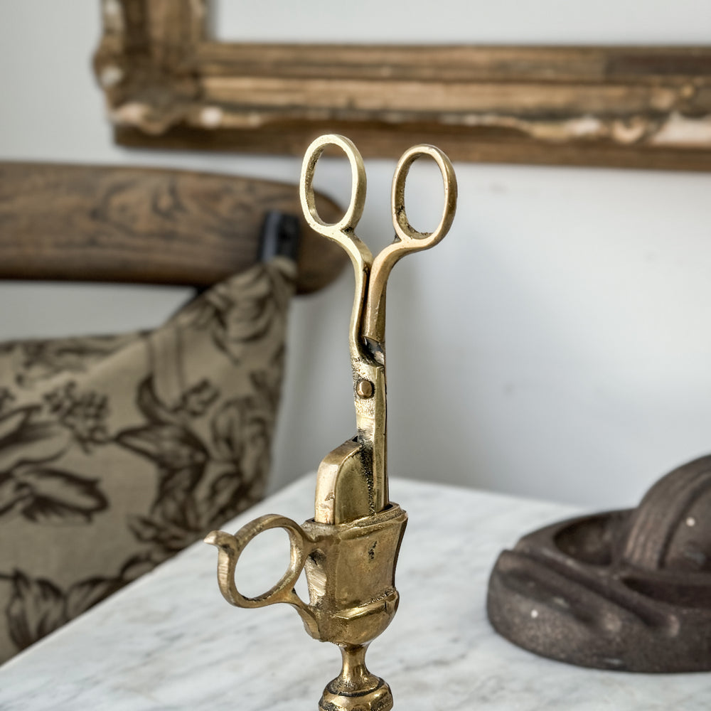 Vintage brass England candle snuffer with stand.