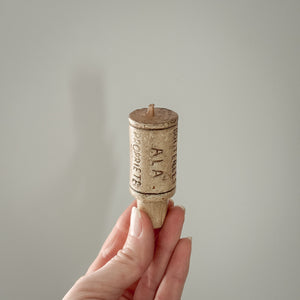 Champagne cork candle.