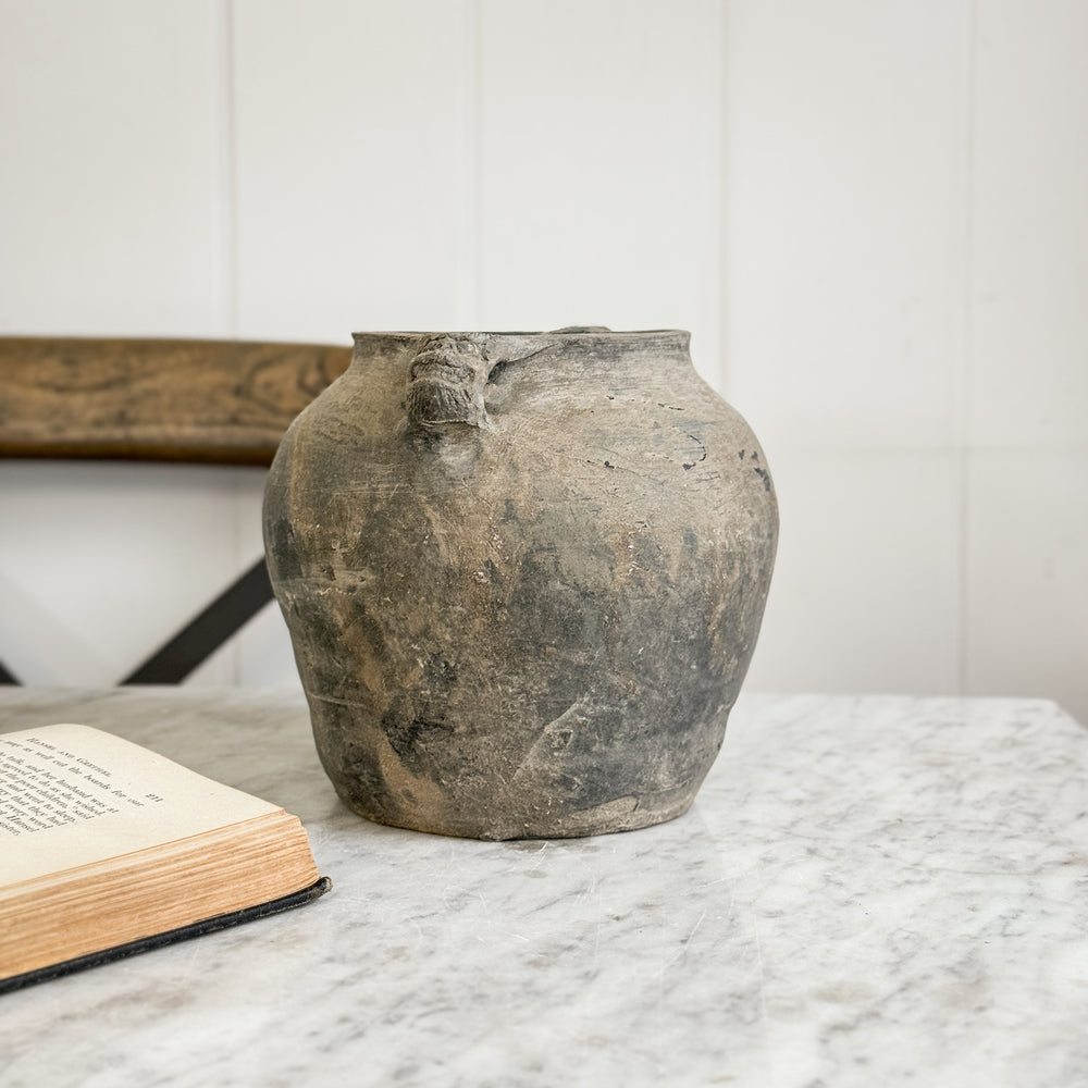 Vintage black pottery vase w/ handles