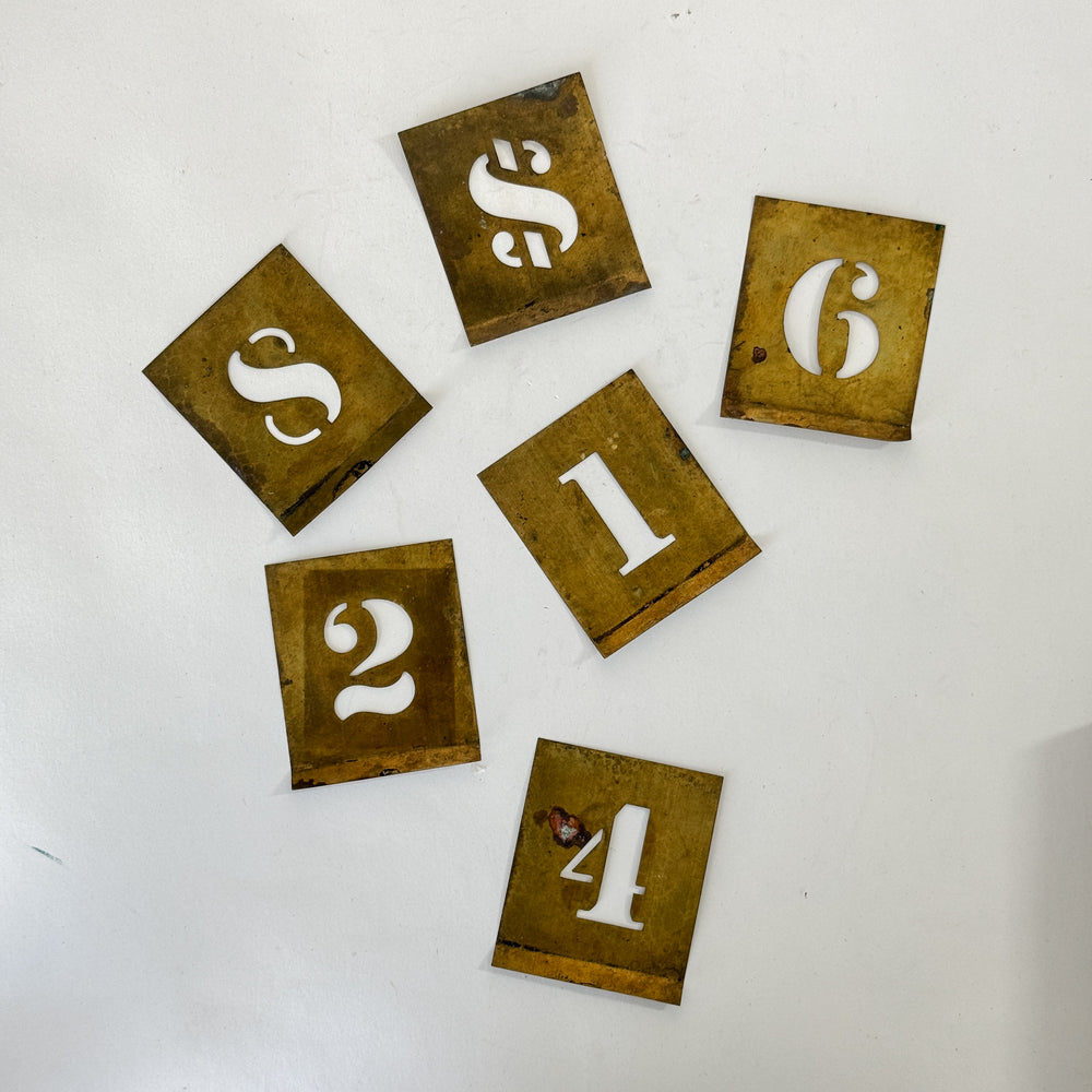 Vintage brass stencil letters set.