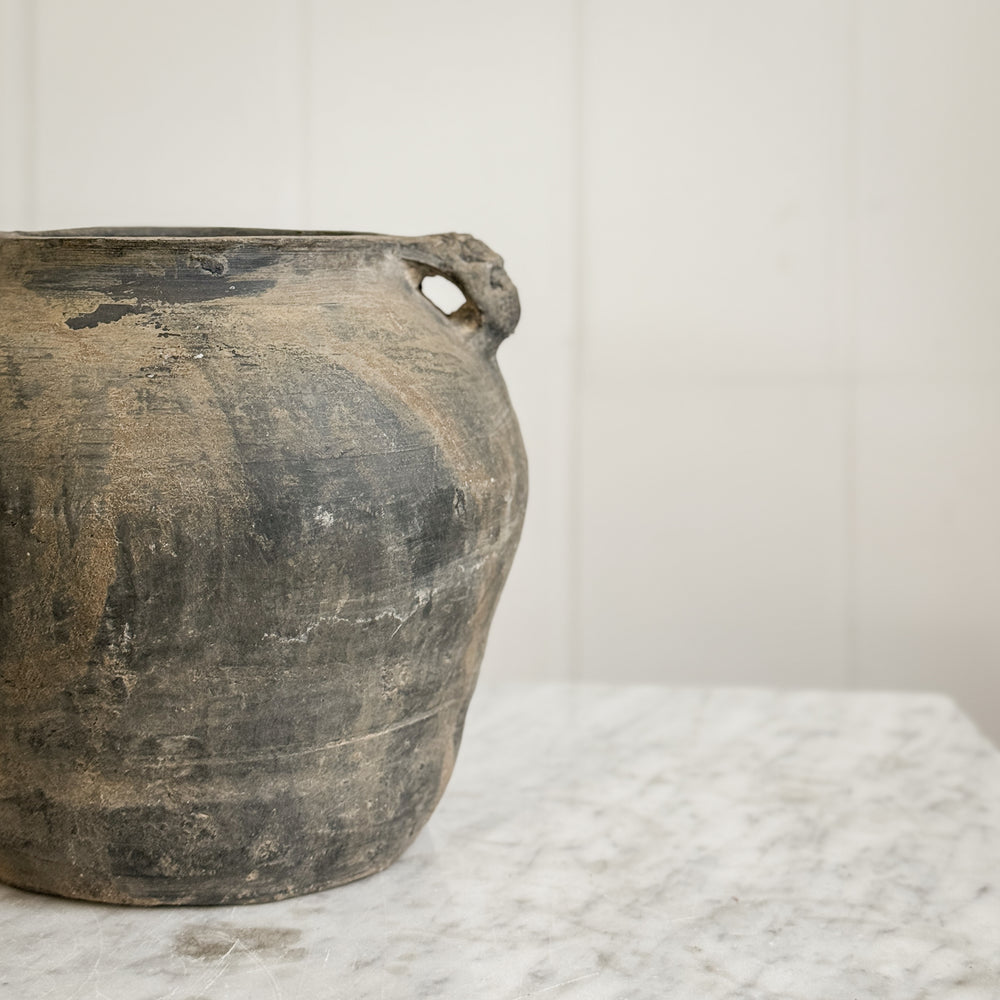 Vintage black pottery vase w/ handles