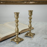 Vintage brass pair slim candlesticks.