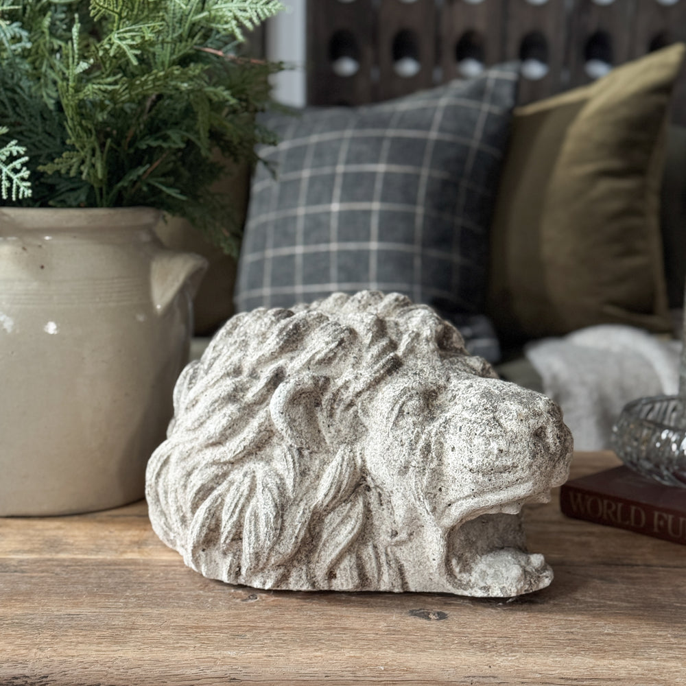 Vintage concrete lion head.