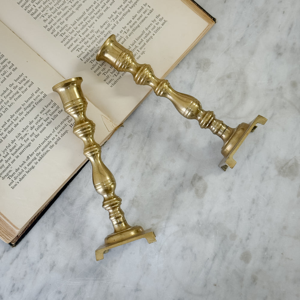 Vintage brass pair slim candlesticks.