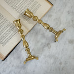 Vintage brass pair slim candlesticks.
