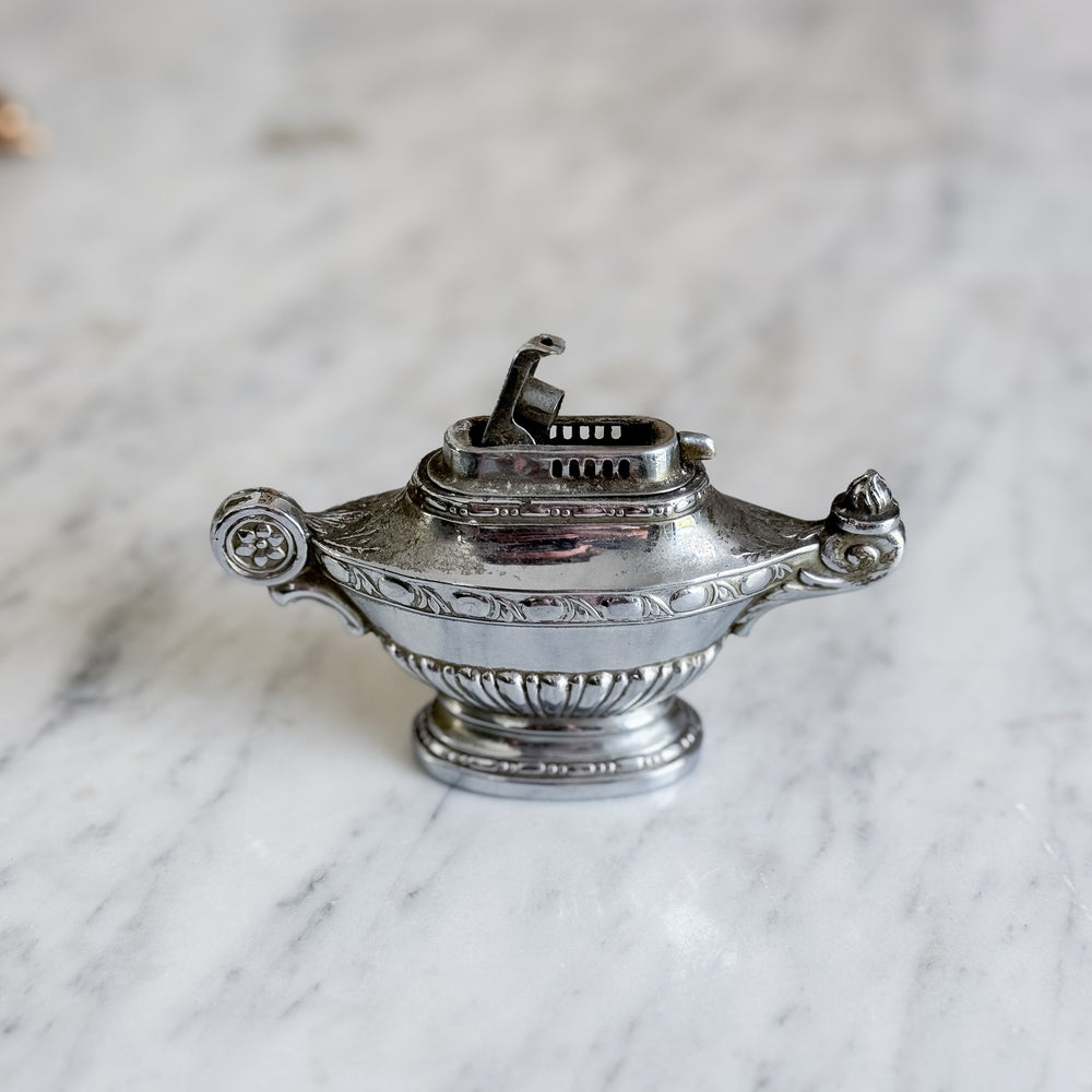 Vintage silverplate lighter.
