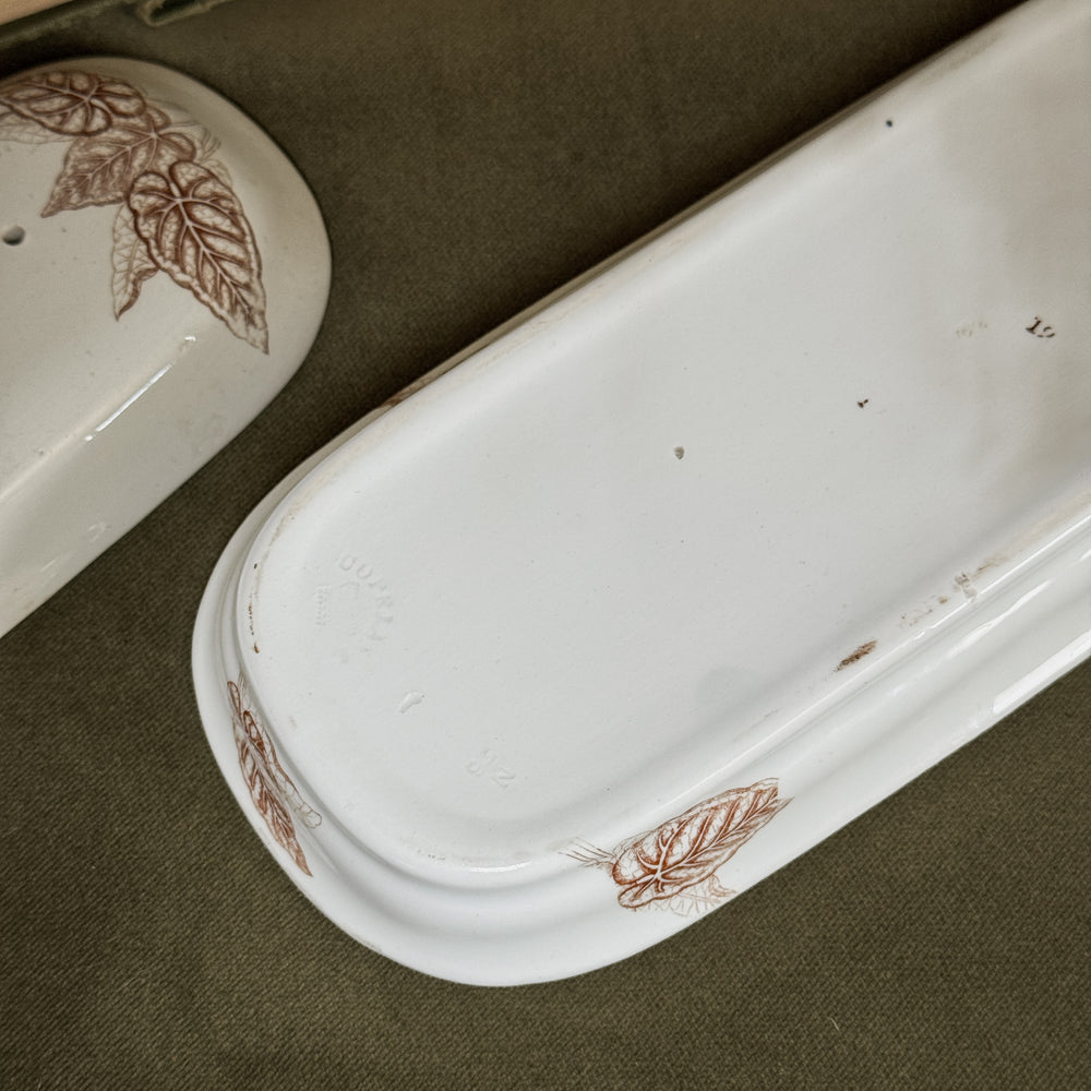 Antique brown ironstone toothbrush holder.