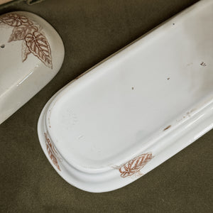 Antique brown ironstone toothbrush holder.