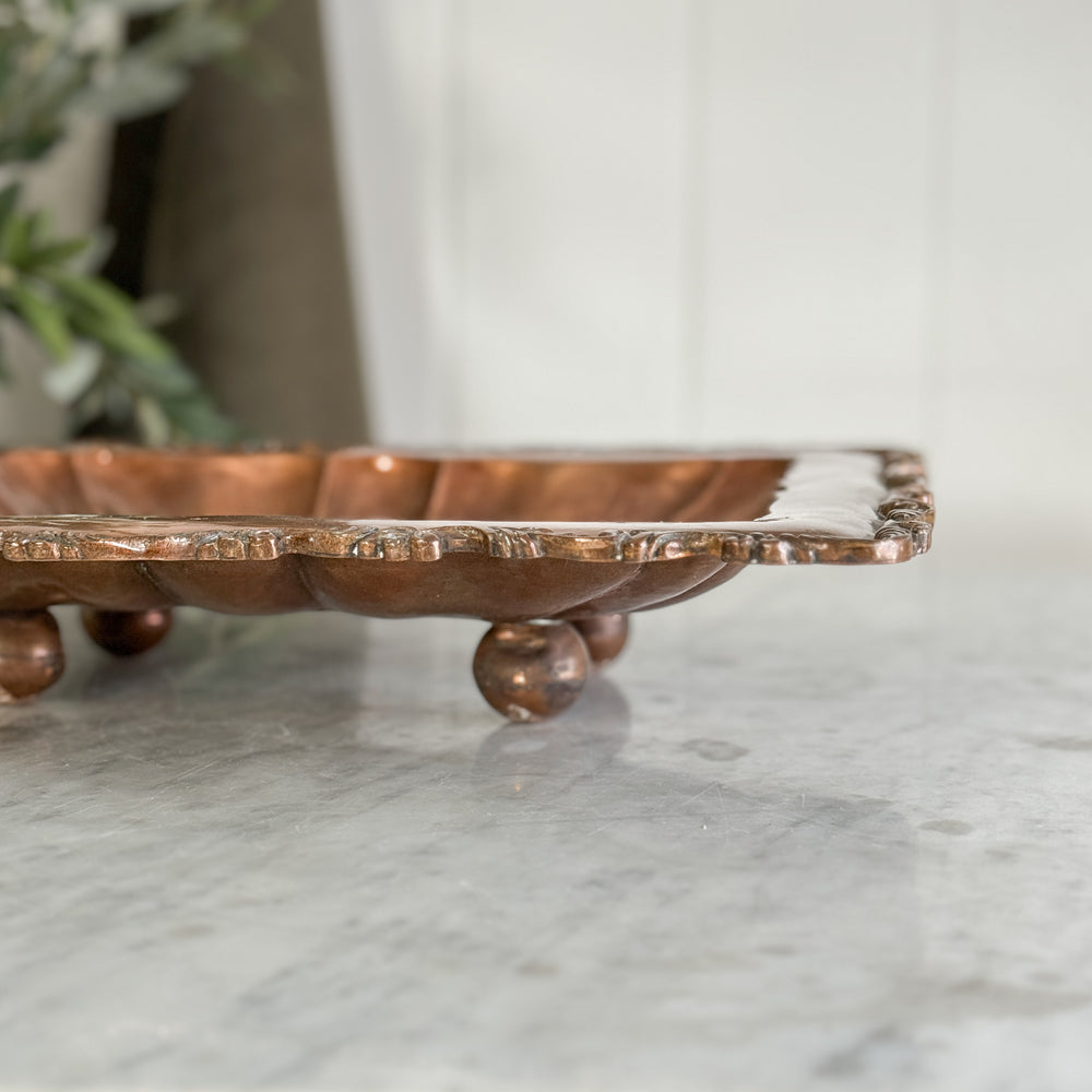 Vintage footed copper tray.