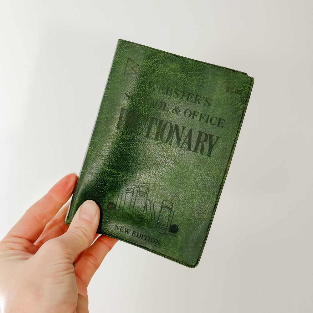 Vintage hunter green pocket dictionary.