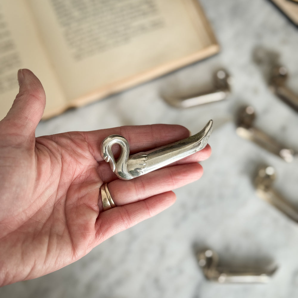 Vintage s/8 swan knife rests.