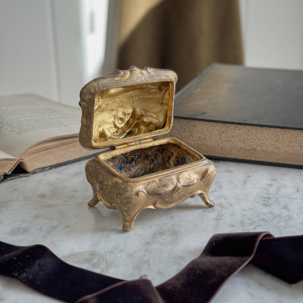 Vintage gold jewellery casket.
