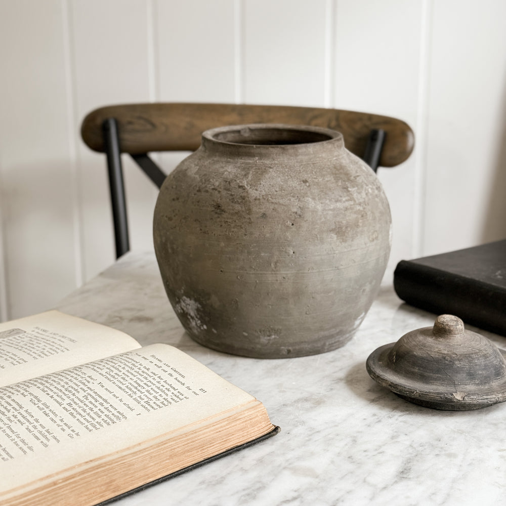 Vintage black pottery vase w/lid.