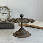 Vintage cast iron stamp holder