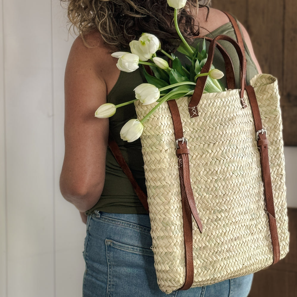 Woven Backpack with leather strap.