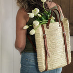 Woven Backpack with leather strap.